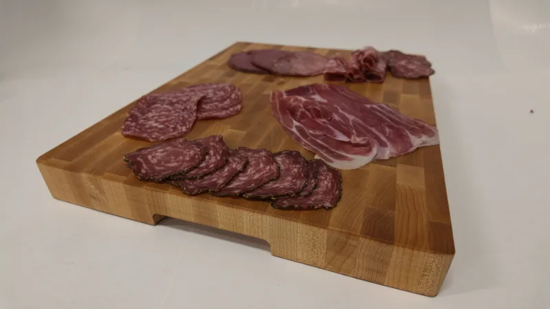 Cloumann end-grain maple board used as a personalised charcuterie board, with salami, coppa and bresaola